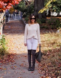 white frame denim with cream vince sweater with marc fisher boots