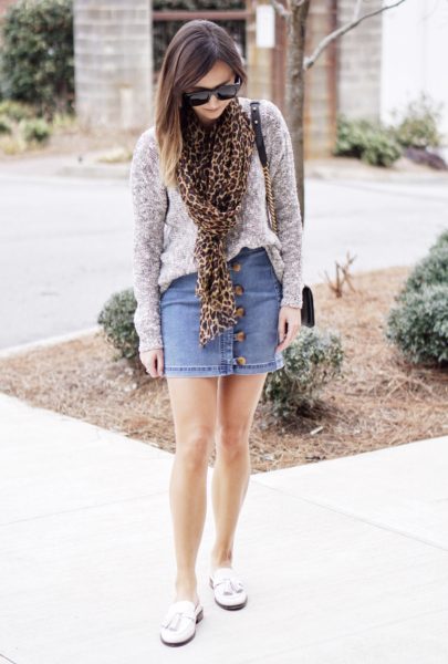 white vionic reagan mule with sweater and denim skirt