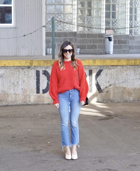 red fuzzy sweater with mother denim