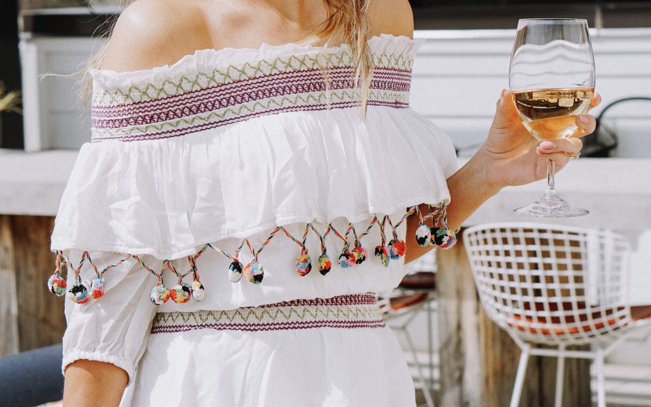 red carter off the shoulder dress with baublebar beaded tassel earrings