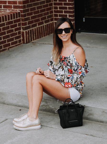 AG white shorts with Parker NY cold shoulder floral top