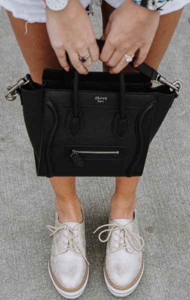 Celine black nano with seven dial brogue shoes