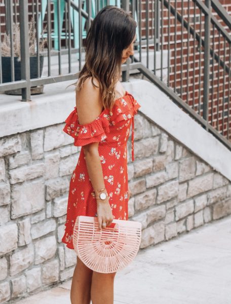 red floral sugar lips dress with pink arc bag