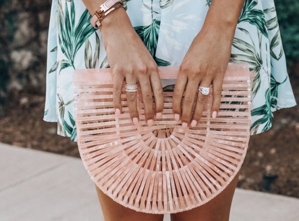blush arc bag with rings and accessories