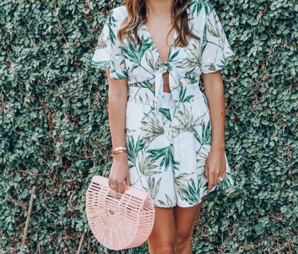 palm print cut out romper with pink arc bag