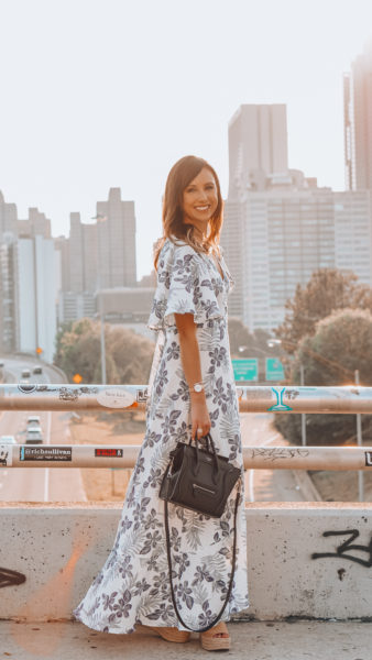 before you floral maxi in front of atlanta view