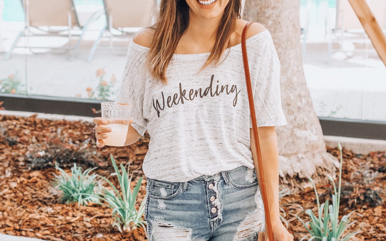 weekending off the shoulder tee with ripped shorts