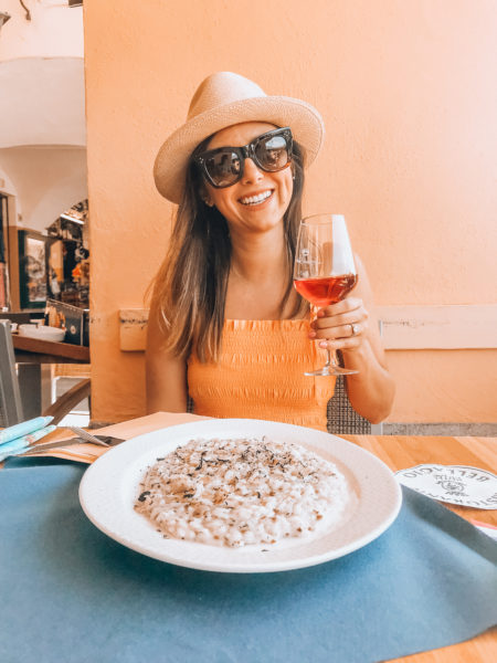 eating risotto in lake como
