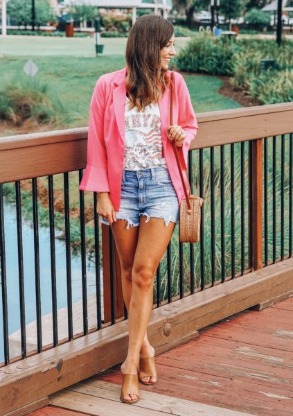 vici pink blazer with band tee and denim shorts