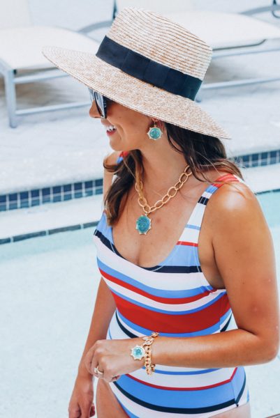 solid and striped swimsuit with celine catherine sunglasses