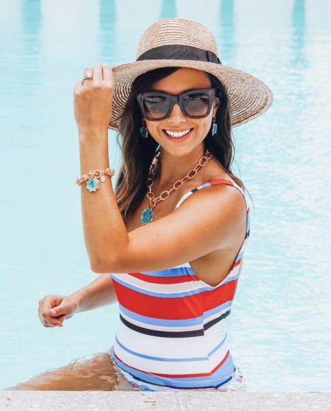 solid and striped swimsuit with susan shaw jewelry
