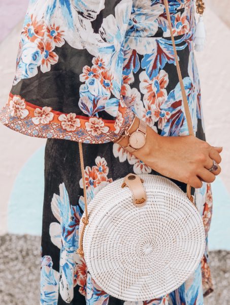 susan shaw necklace with white rattan bag