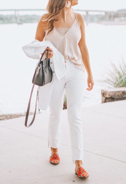 white frame denim jeans with andre assous embroidered mules