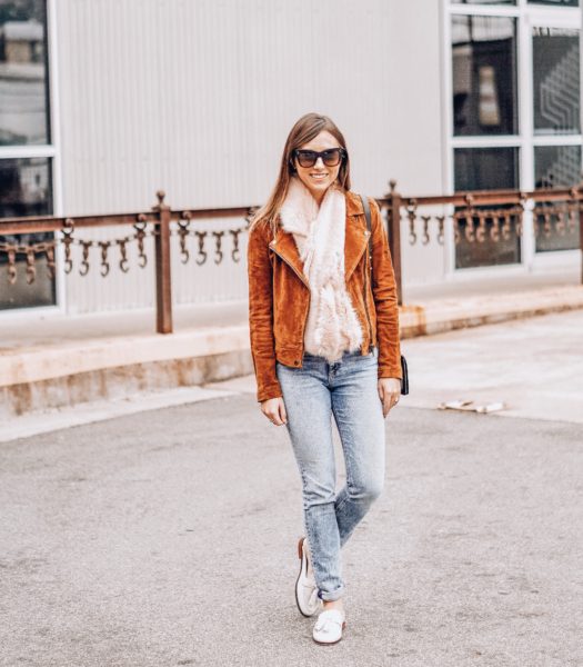 faux fur scarf with suede jacket and white mules
