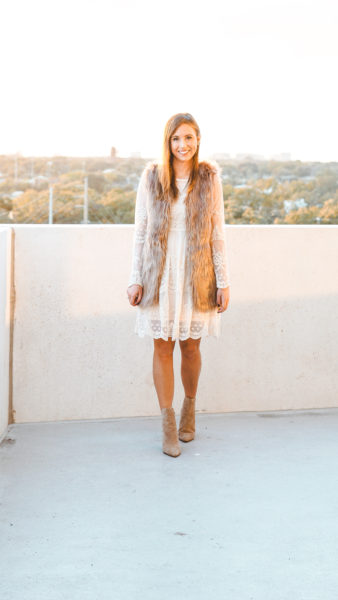 white lace dress with fur vest outfit