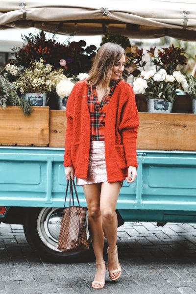 red cardigan with sequin skirt