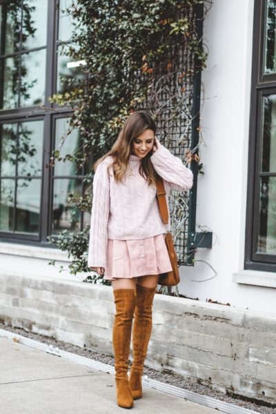 blush turtleneck sweater with pink button up skirt