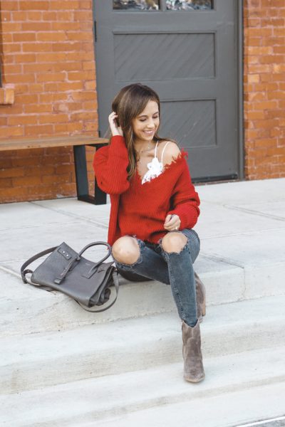 shein ripped red sweater with white lace bralette