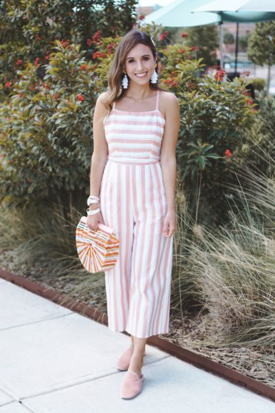 stella boutique striped jumpsuit with susan shaw tassel earrings