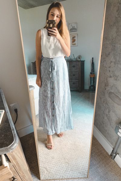 trying on stitch fix skirt and tank in mirror
