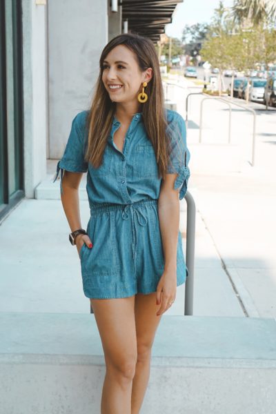 express chambray romper with yellow earrings