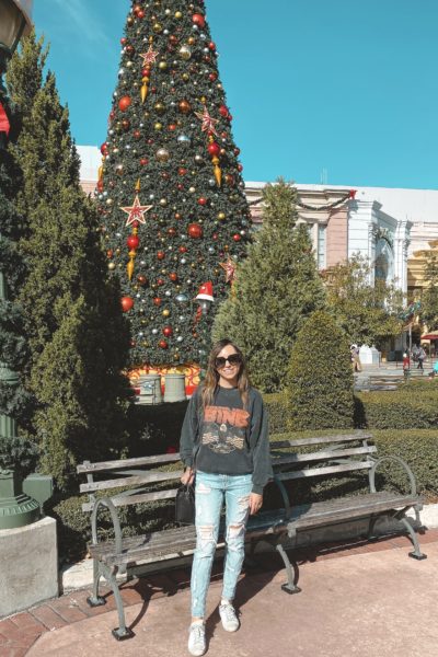 anine bing vintage sweatshirt in front of universal christmas tree