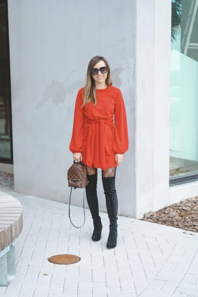 red amazon dress with gucci tights