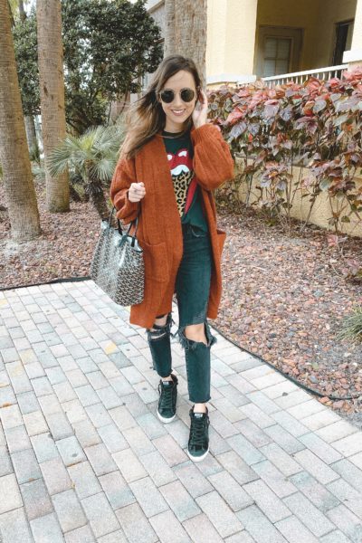 rust cardigan with leopard tongue tee and golden goose sneakers