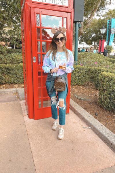 target tie dye waffle knit with ripped jeans at telephone booth