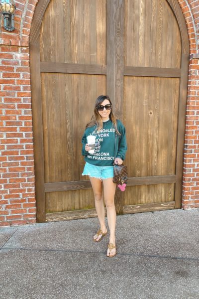 anine bing city sweatshirt with agolde shorts and lv palm springs