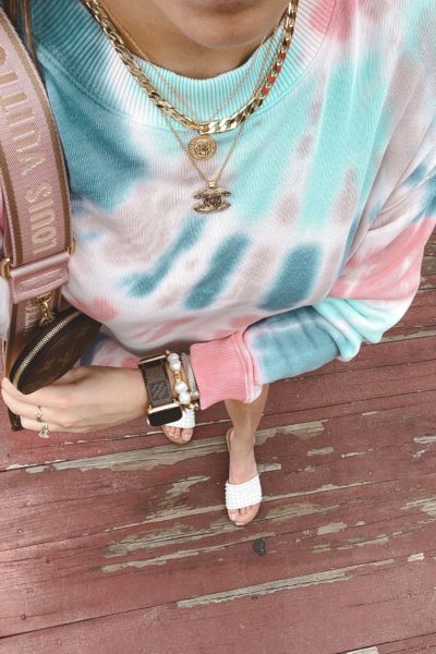 american eagle tie dye sweatshirt with louis vuitton apple watch band and chanel necklace