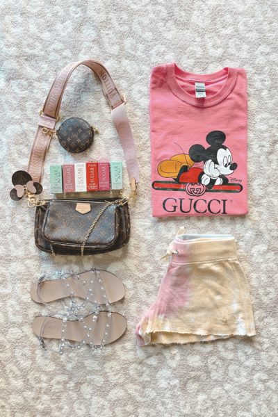 pink gucci tee with tie dye shorts and louis vuitton multi pochette