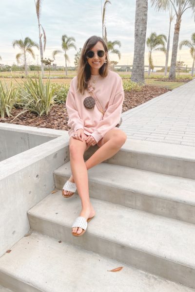 american eagle pink sweatshirt with pink bike shorts and steve madden farryn sandals