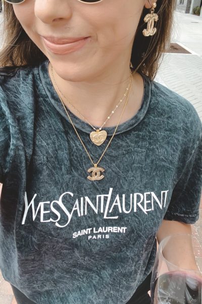 ysl black acid wash tee with chanel layered necklaces
