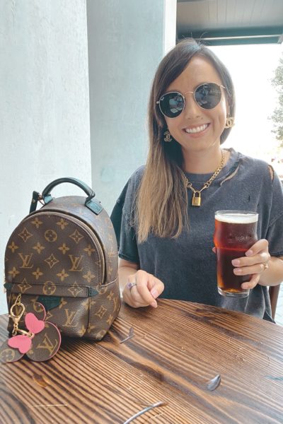 free people black rubi tee with louis vuitton lock necklace and palm springs mini