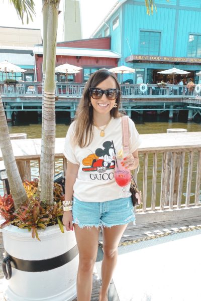 wearing lately post 35 cream gucci mickey mouse tee with agolde shorts and louis vuitton multi pochette