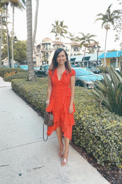 hale bob red dress with louis vuitton palm springs and clear heels 