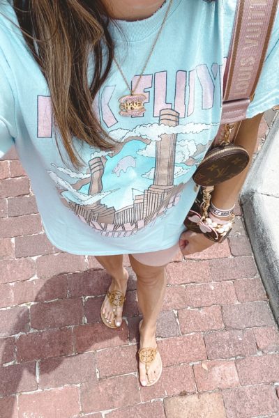 blue pink floyd tee with pink bike shorts and chanel necklace