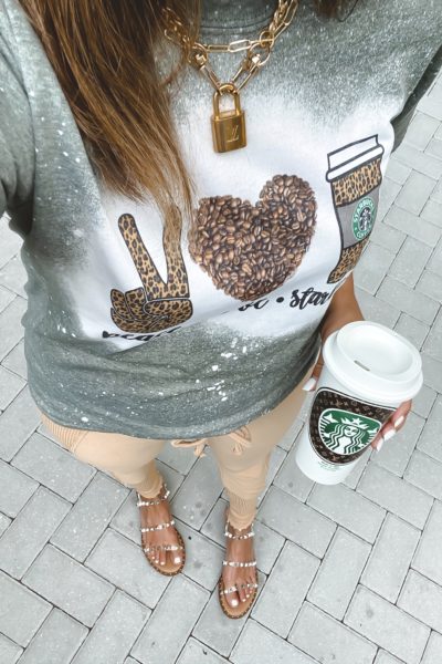 peace love starbucks tee with joggers and steve madden travel sandals