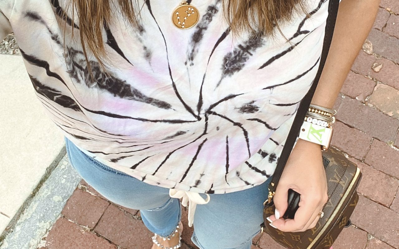 nphilanthropy tie dye tee with sequin jewelry zodiac necklaces and blue joggers