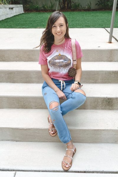 louis vuitton lips tee with ripped joggers and steve madden travel sandals