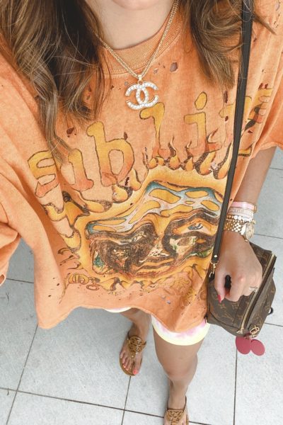 sublime orange tshirt dress with chanel necklace and louis vuitton palm springs mini