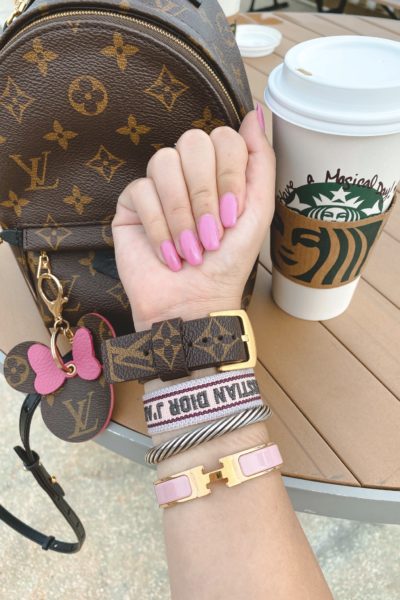 opi two timing the zone with louis vuitton apple watch band and starbucks cup