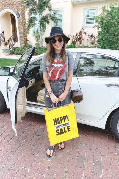 rolling stones tee with brixton hat and nsale bag