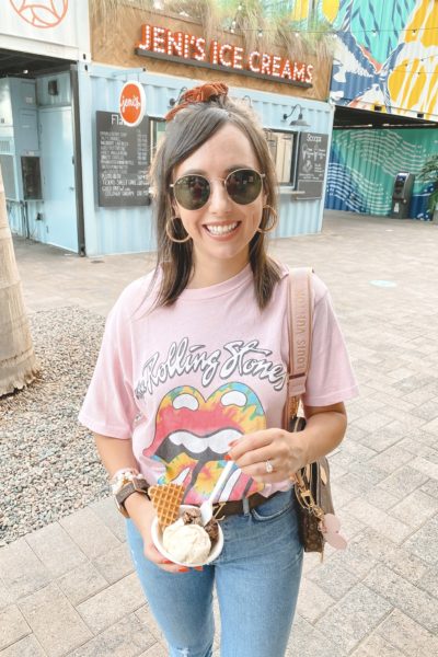 daydreamer rolling stones tie dye tongue tee with louis vuitton multi pochette and gold hoops