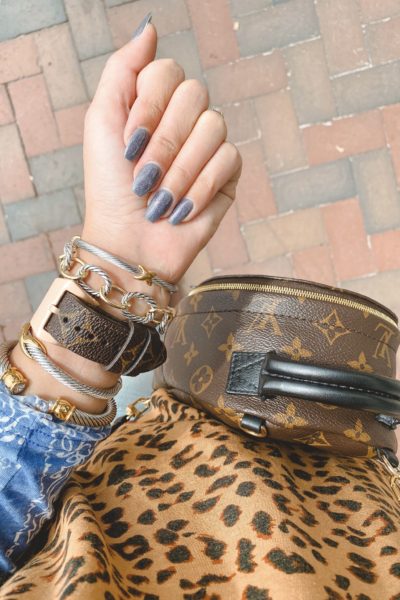 opi leonardos model color with louis vuitton apple watch band and styled collection bracelets