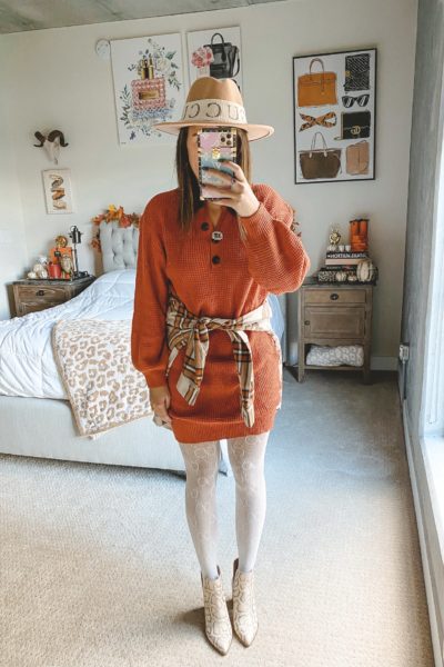 rust waffle knit sweater dress with hat and white gucci tights