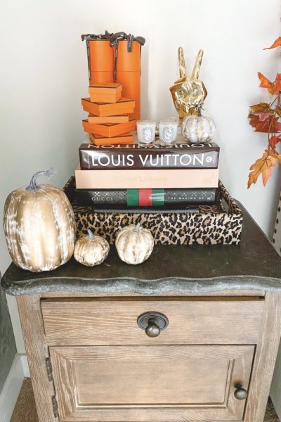 halloween bedroom decor leopard tray with pumpkins and hermes boxes on nightstand