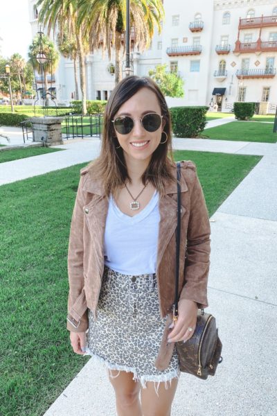 blanknyc suede moto jacket with free people leopard mini skirt and gucci necklace