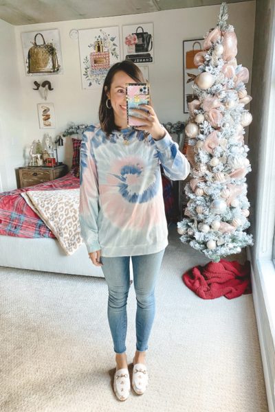 amazon pink and blue tie dye sweatshirt with jeans and white mules